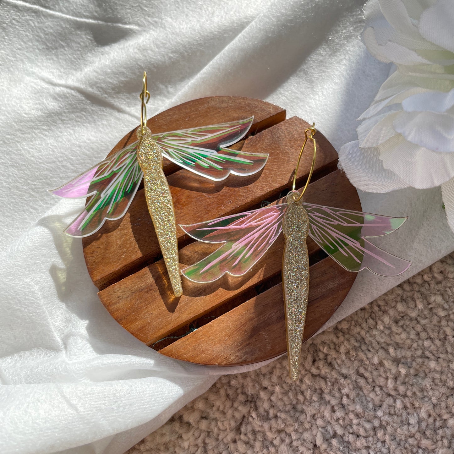 Firefly Hoops - Shimmer Golden and Holographic - Nian by Nidhi - placed in a white and brown background
