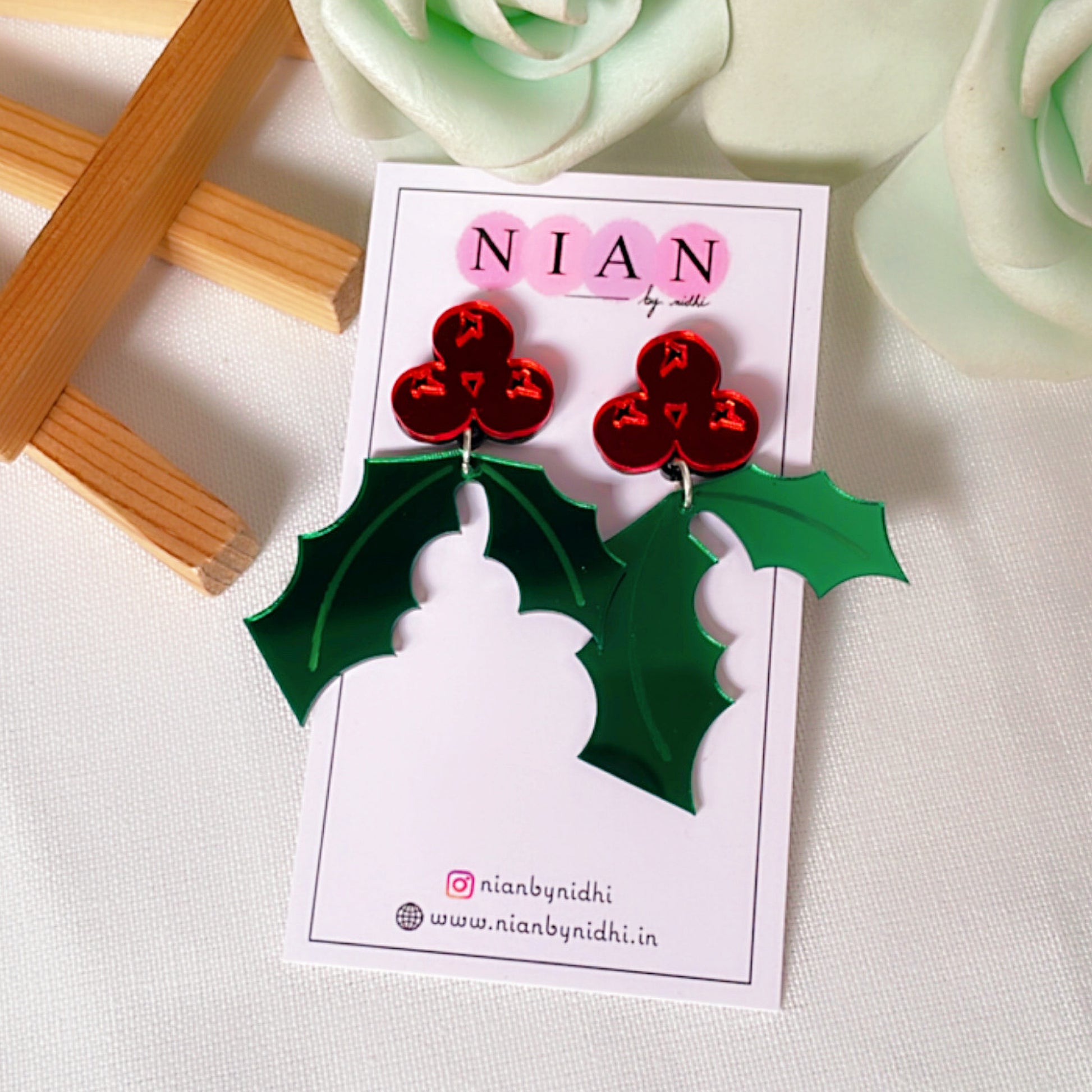 Holly Leaf Earrings - Green and Red- Nian by Nidhi- placed in a white background