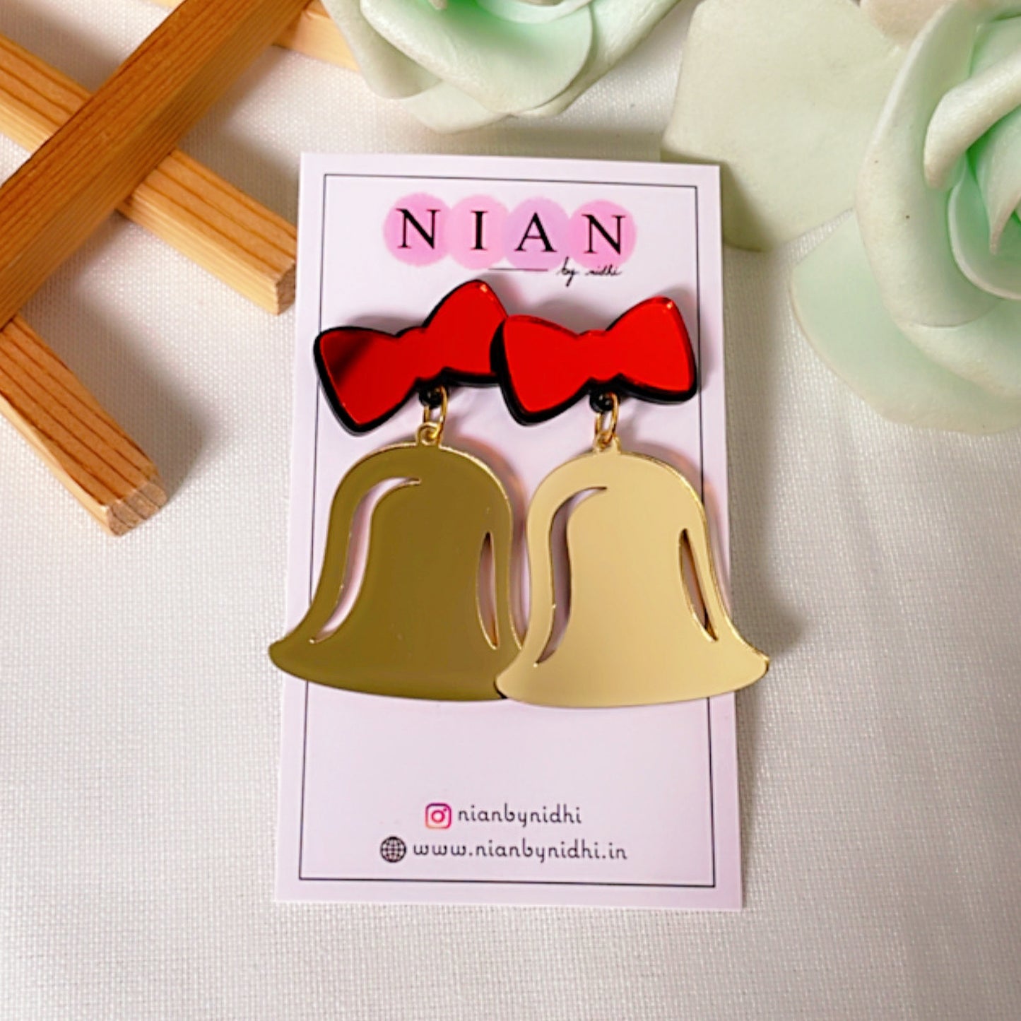 Jingle Bell Earrings - Red and Golden - Nian by Nidhi - placed in a white background