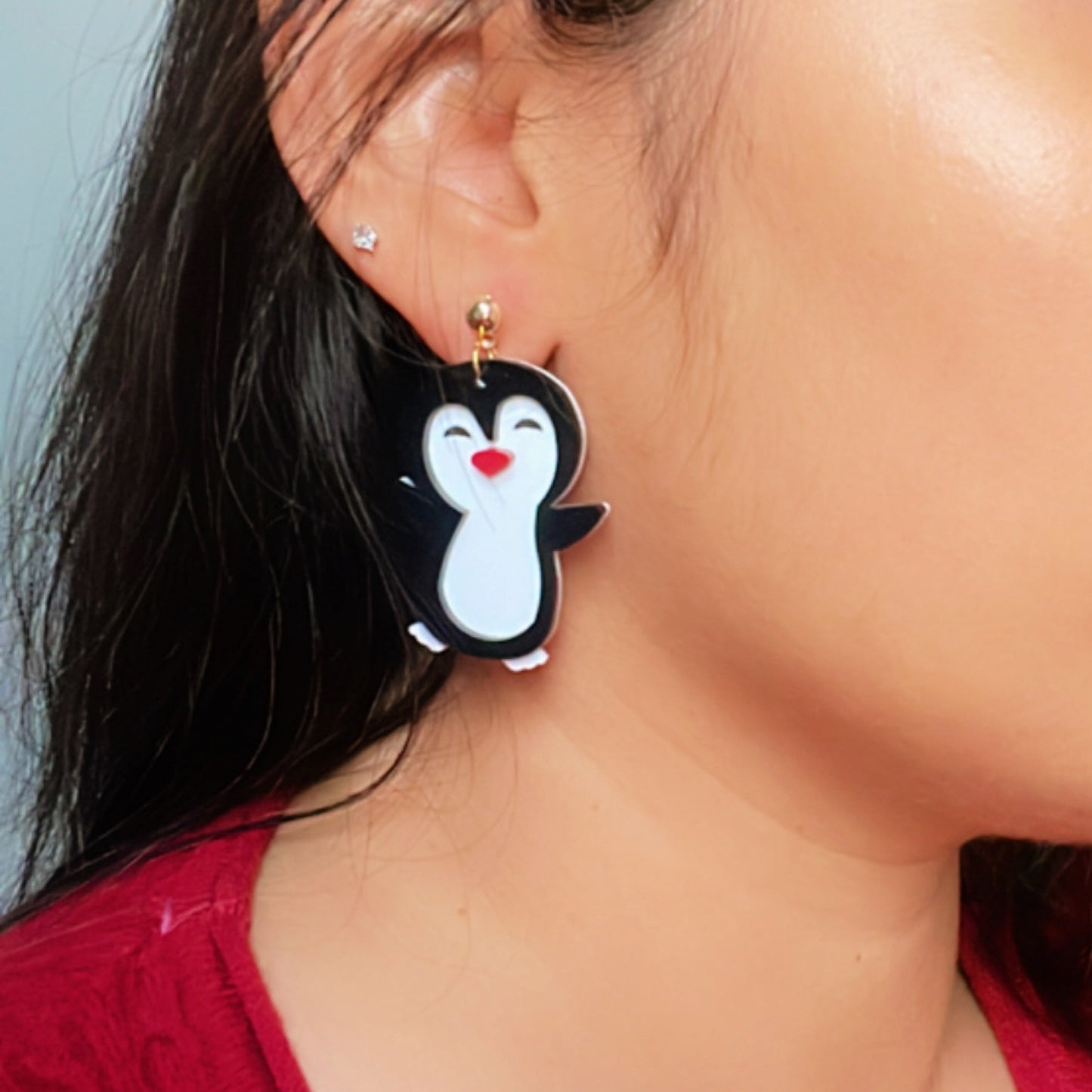 Punny Penguin Earrings - White, Black and Red - Nian by Nidhi - worn by a woman