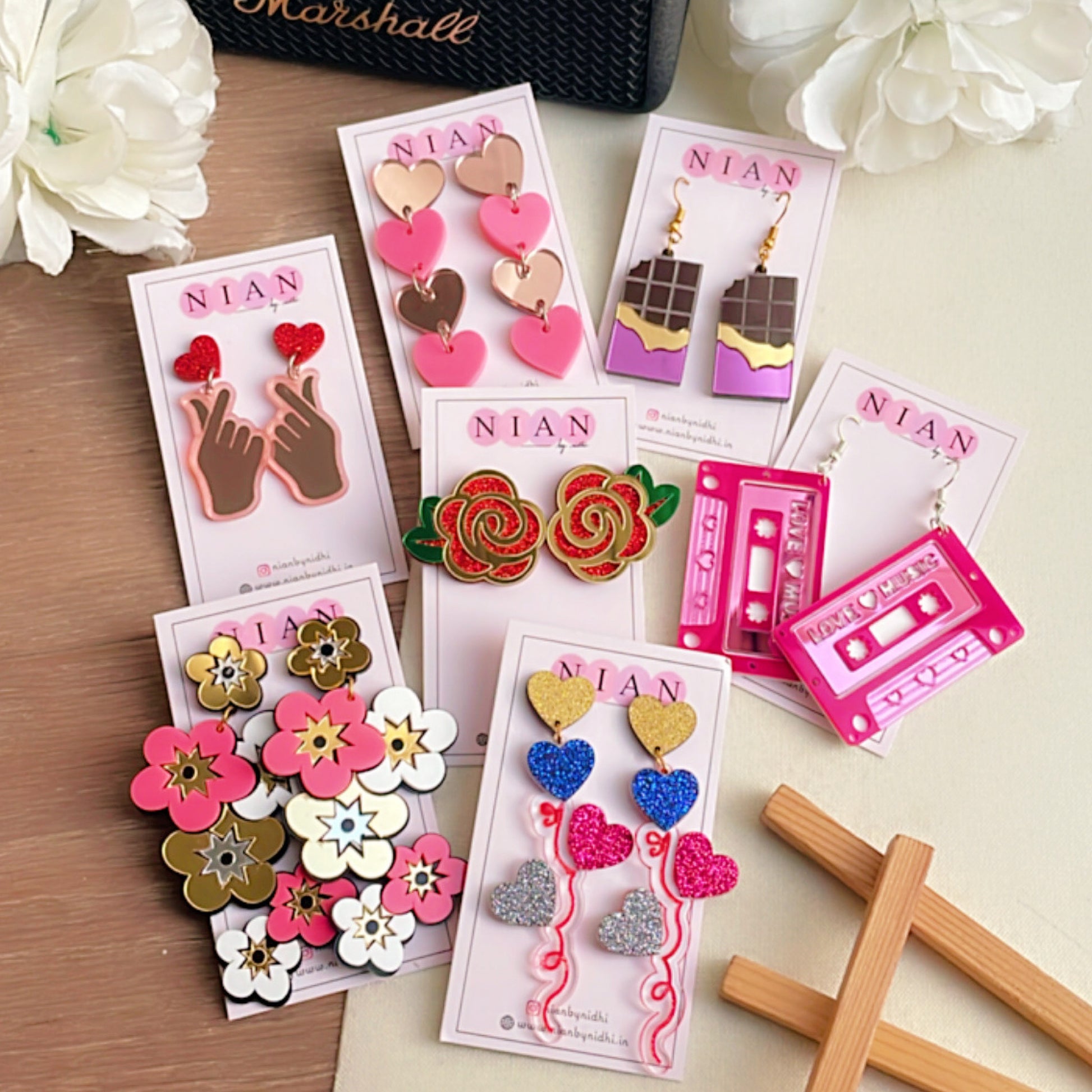 Seven Charms of Valentine (Set of 7) - consists of 7 earrings - Ravishing Rose Earrings, Balloon Bouquet Earrings, Love Cassette Earrings, Floral Fetish Danglers, Choco Candy Earrings, K-Pop Love Earrings , Little Heart Danglers - Nian by Nidhi