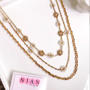 Floral Dream Layered Neckalce - Golden - Nian by Nidhi - placed in a white background