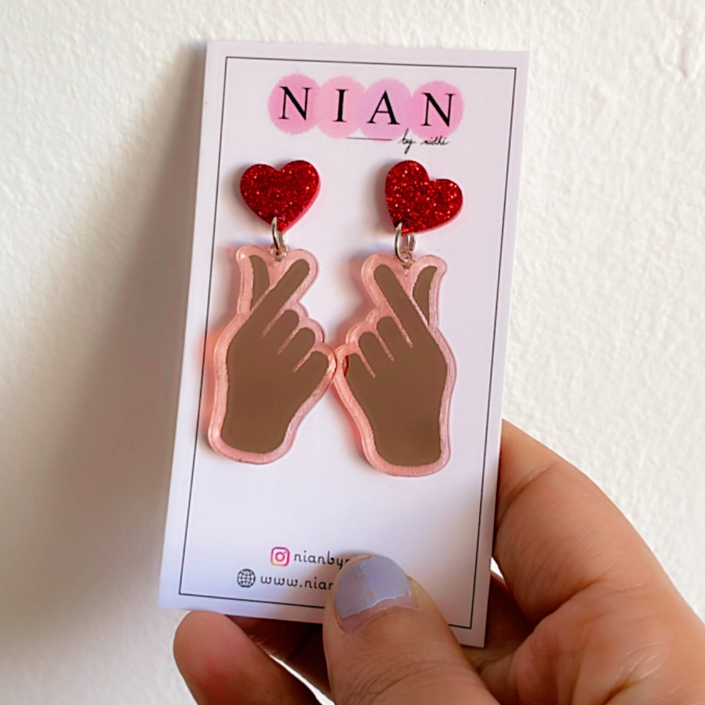 K-Pop Love Earrings - Rosegold and Red - Nian by Nidhi - placed in a white background