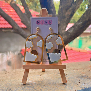 Cloudy Window Earrings - Nian by Nidhi - placed in a natural background