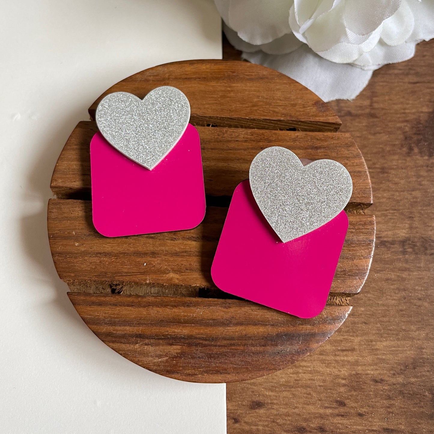 Squary Heart Earrings - Nian by Nidhi - placed in a brown and white background