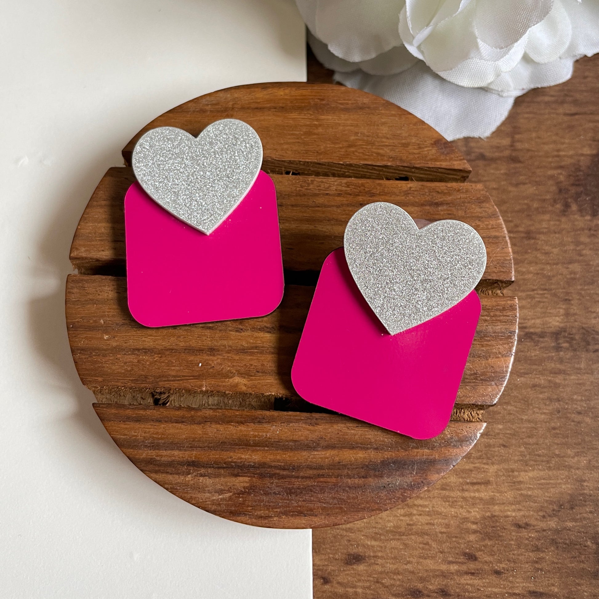 Squary Heart Earrings - Nian by Nidhi - placed in a brown and white background