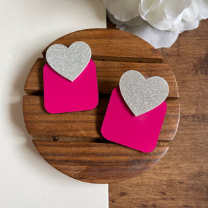 Squary Heart Earrings - Nian by Nidhi - placed in a brown and white background
