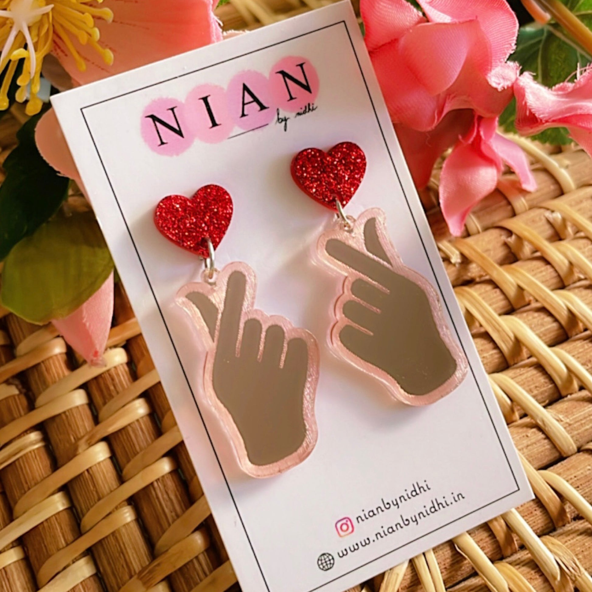 K-pop Love Earrings - Nian by Nidhi - placed in a bamboo brown background