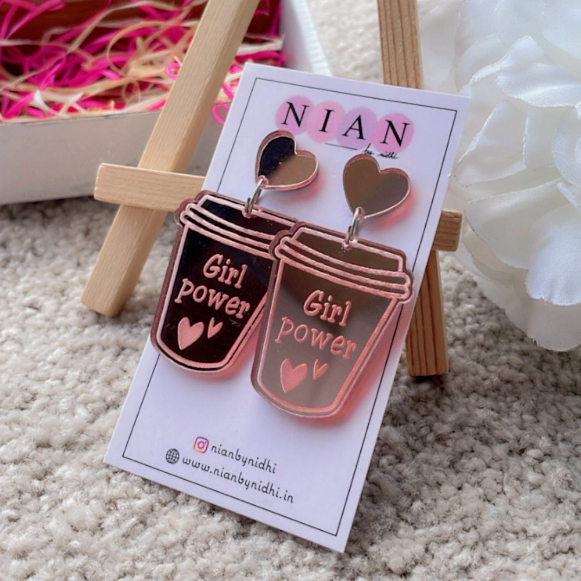 Girl Power Earrings - Nian by Nidhi - placed in  white and grey background