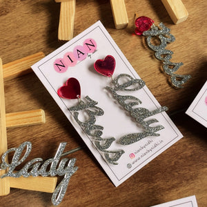Boss Lady Earrings - Nian by Nidhi - placed in a brown background