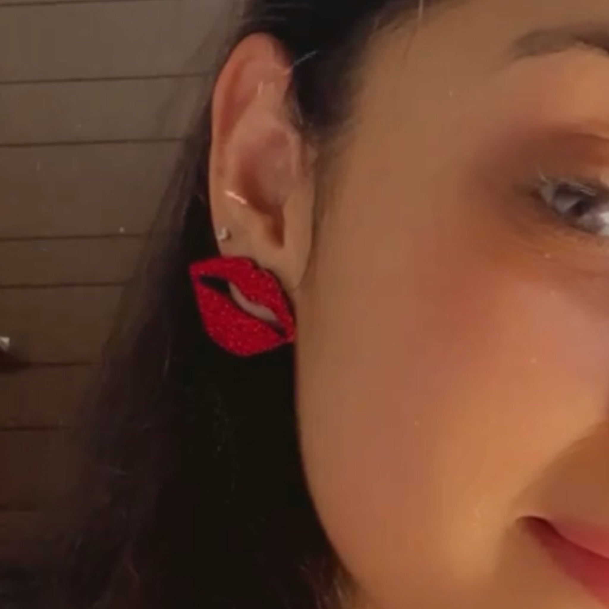 Shimmer Lips Studs - Red - Nian by Nidhi - worn by a woman