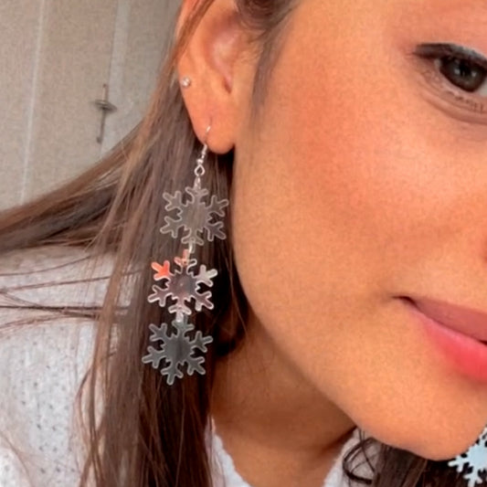 Snowflake Danglers - Holographic, Glassy Blue, and Silver - Nian by Nidhi - worn by a woman