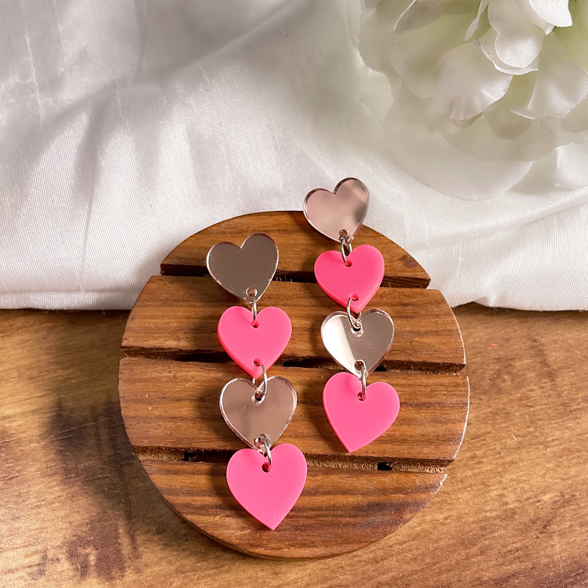 Little Heart Danglers - Pink and Rosegold - Nian by Nian - in a white and brown background