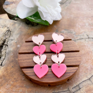 Little Heart Danglers - Pink and Rosegold - Nian by Nian - in a white and brown background