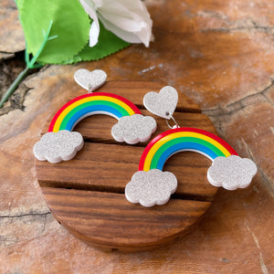 Rainbow Earrings - multi color - Red, Yellow, Green, and Blue - Silver clouds and hearts - Nian by Nidhi - in a white and brown background