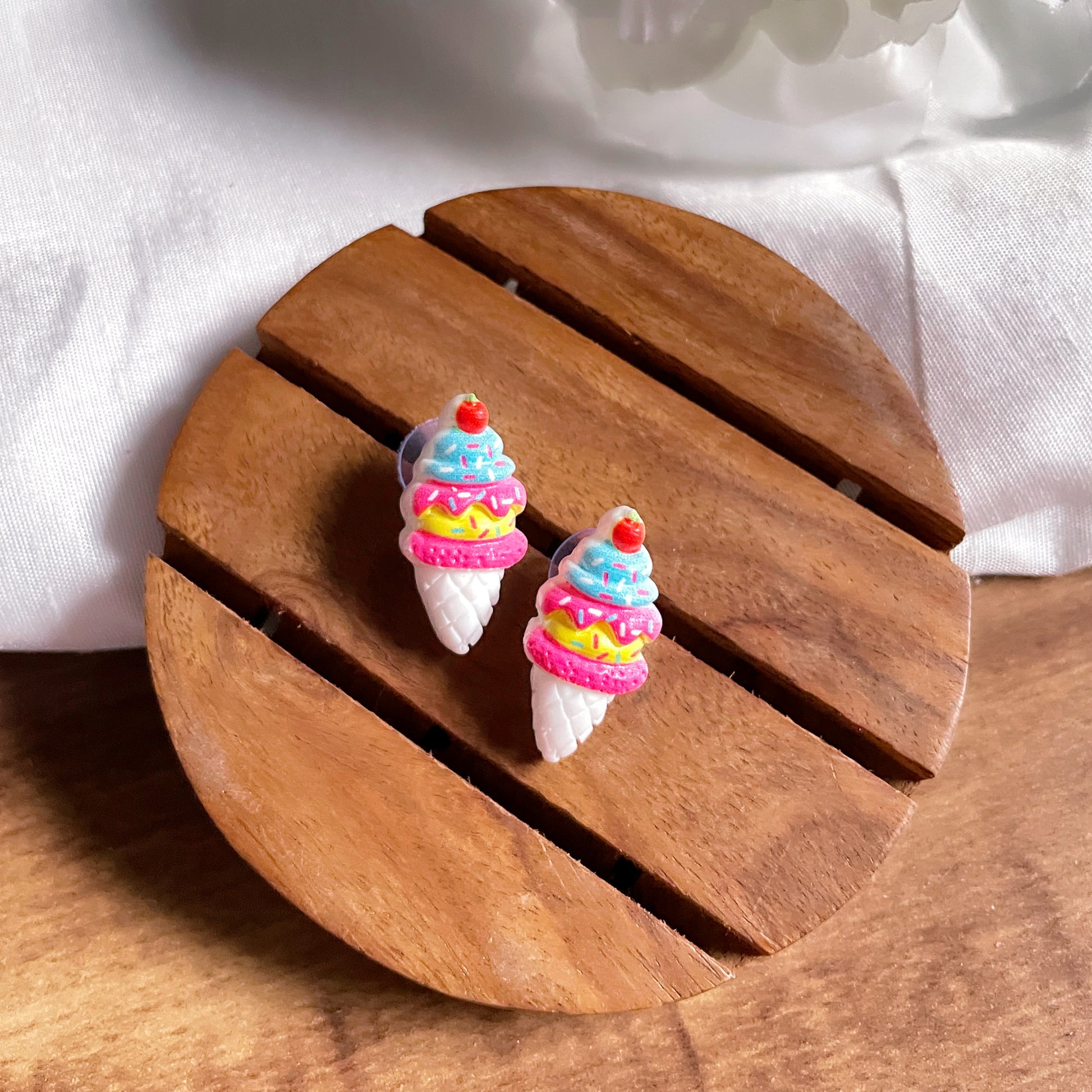 Sundae Studs - Multi color (white, pink, yellow, blue, and red) - Nian by Nidhi - in a white and brown background