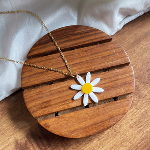 Daisy Set - White and Yellow - Nian by Nidhi - consists of Earrings and a neckpiece with a pendant - in a white and brown background