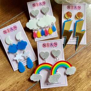All Thinks Sky Earrings Combo by Nian by Nidhi, containing Rainy Cloud Earrings, Galaxy Earrings, Rainbow Earrings and Lightning Earrings