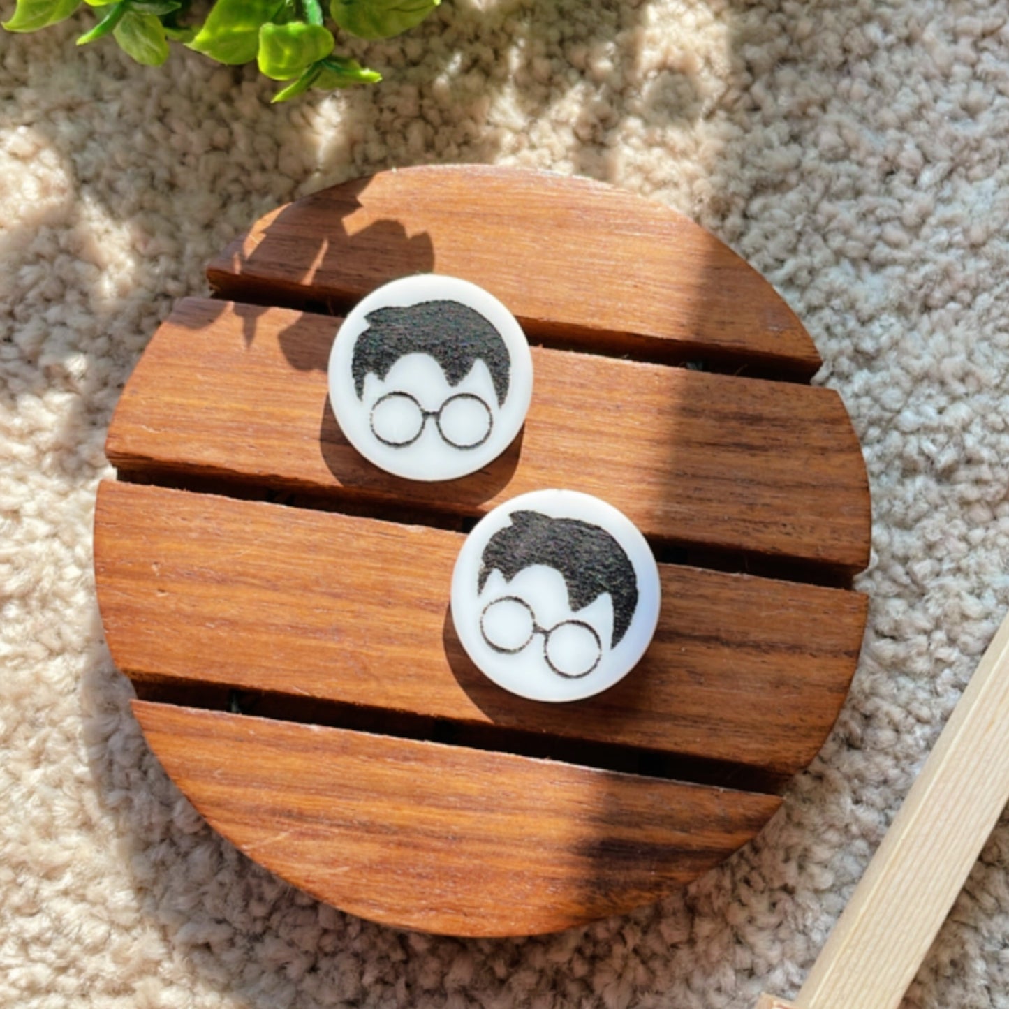 Harry Potter Face Studs - White and Black - Nian by Nidhi - placed in a light beige background