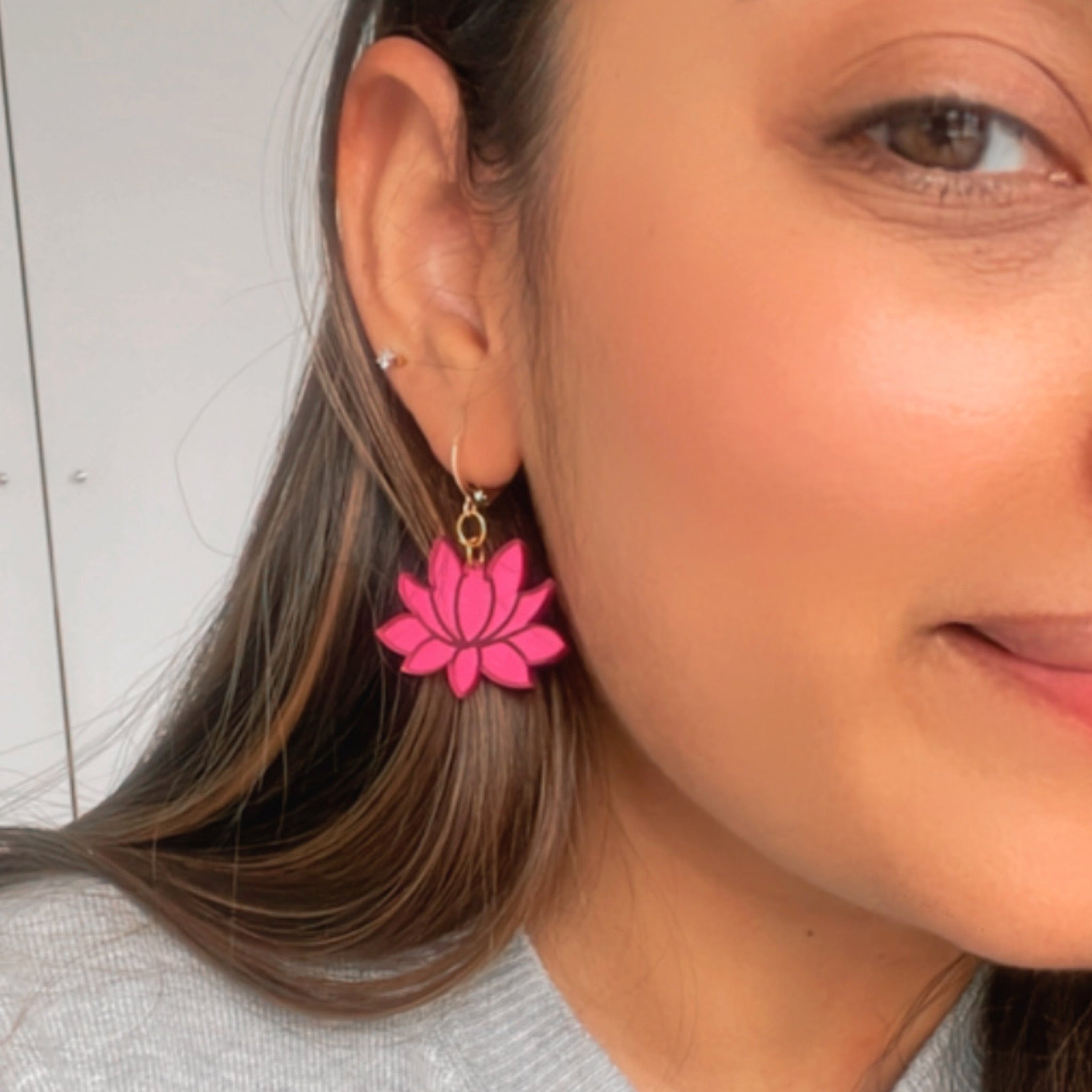 Lotus Danglers - Glossy Pink - Nian by Nidhi - worn by a woman