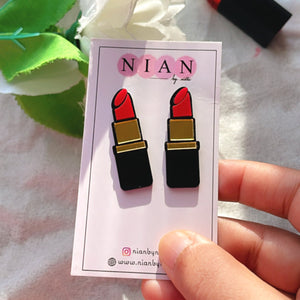 Lipstick Studs - Black and Red - Nian by Nidhi - placed in a white and green background