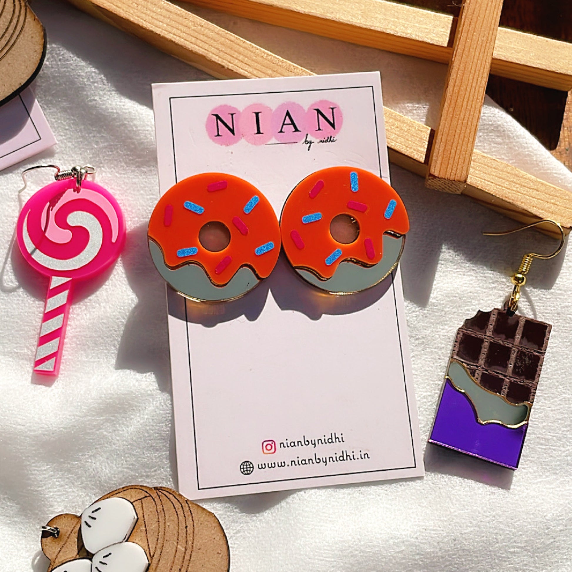 Donut Delight Earrings - Orange and Golden - Nian by Nidhi - placed in a white background