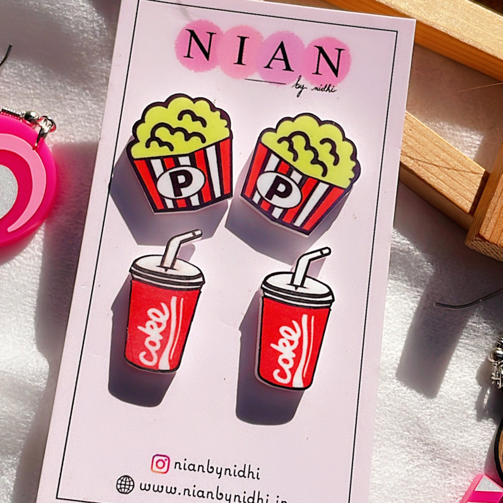 Popcorn and Coke Studs (Set of 2) - Multi-Color - Nian by Nidhi - placed in a white and brown background