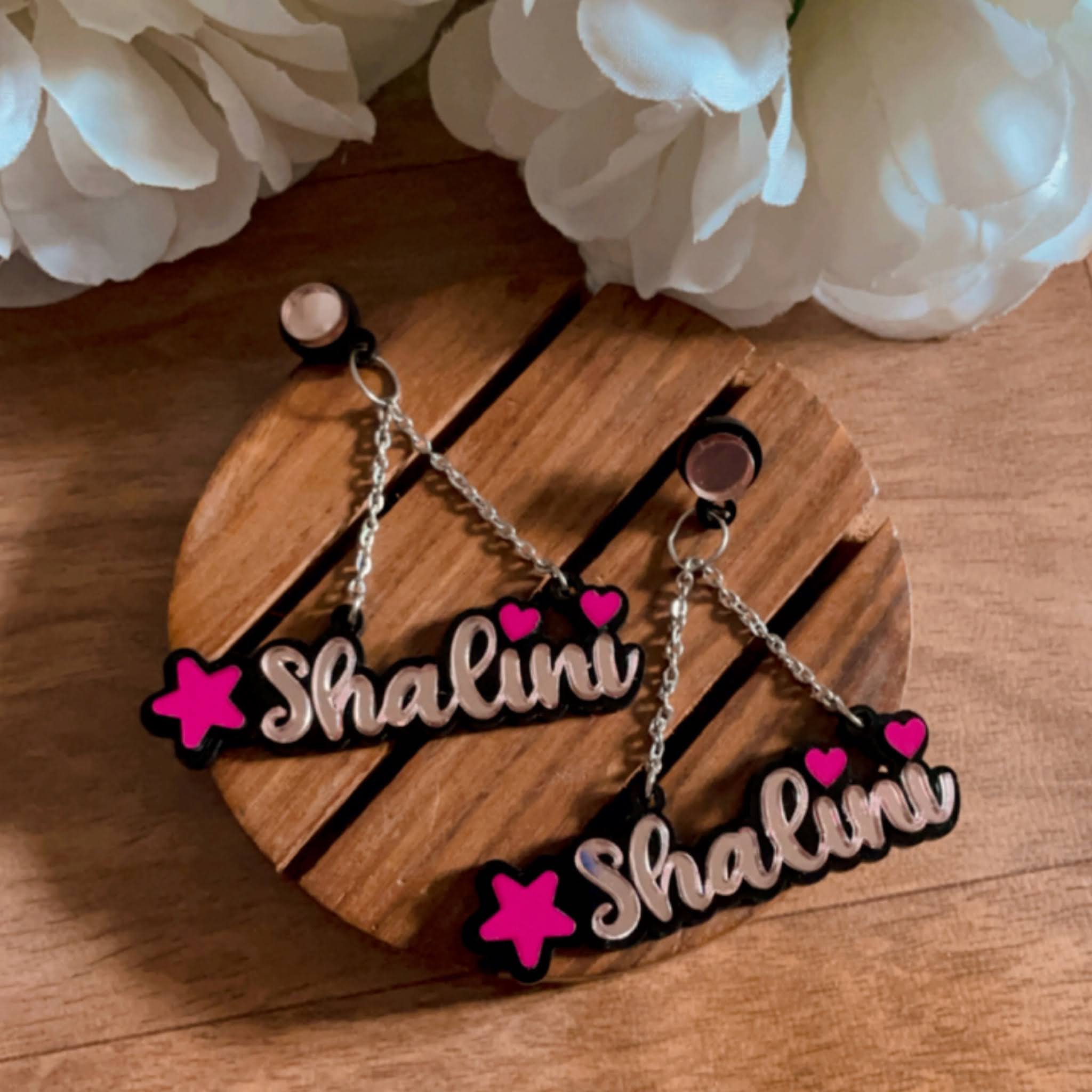 Customised Alphabet Earrings - personalised with a text - "⭐️Shalini" - pink and rose gold - Nian by Nidhi - in a brown background