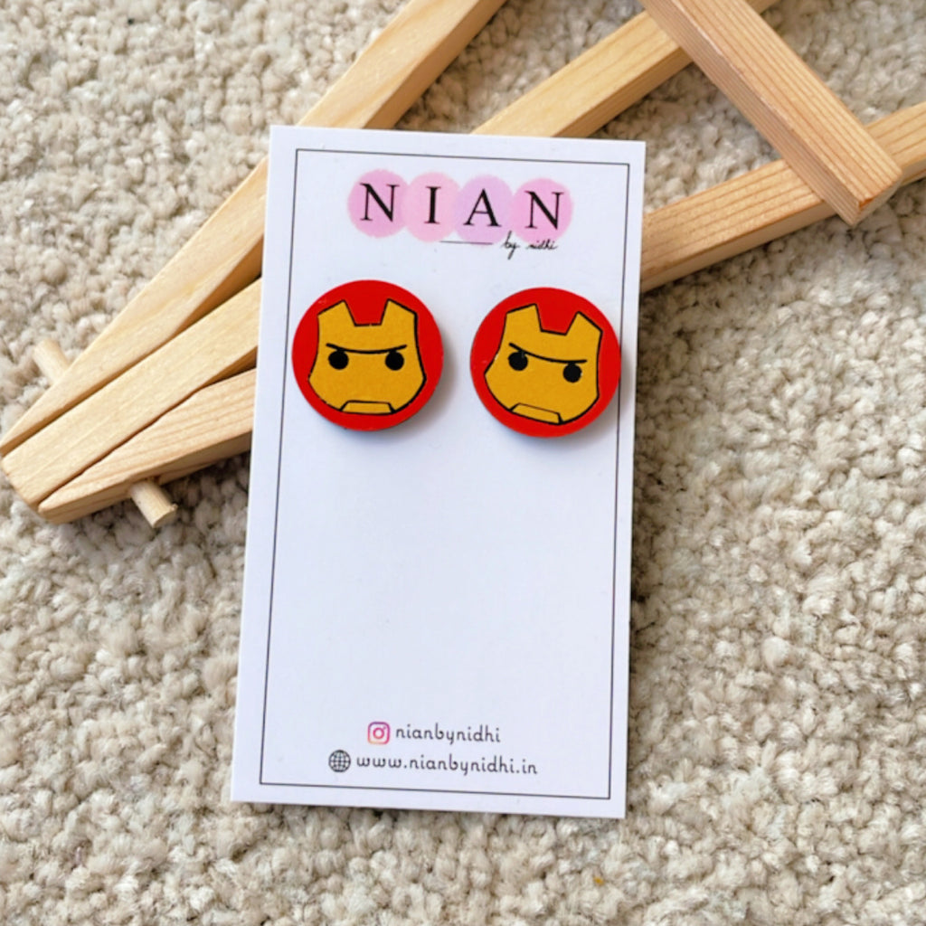 Iron Man Studs - Nian by Nidhi - placed in a light beige background