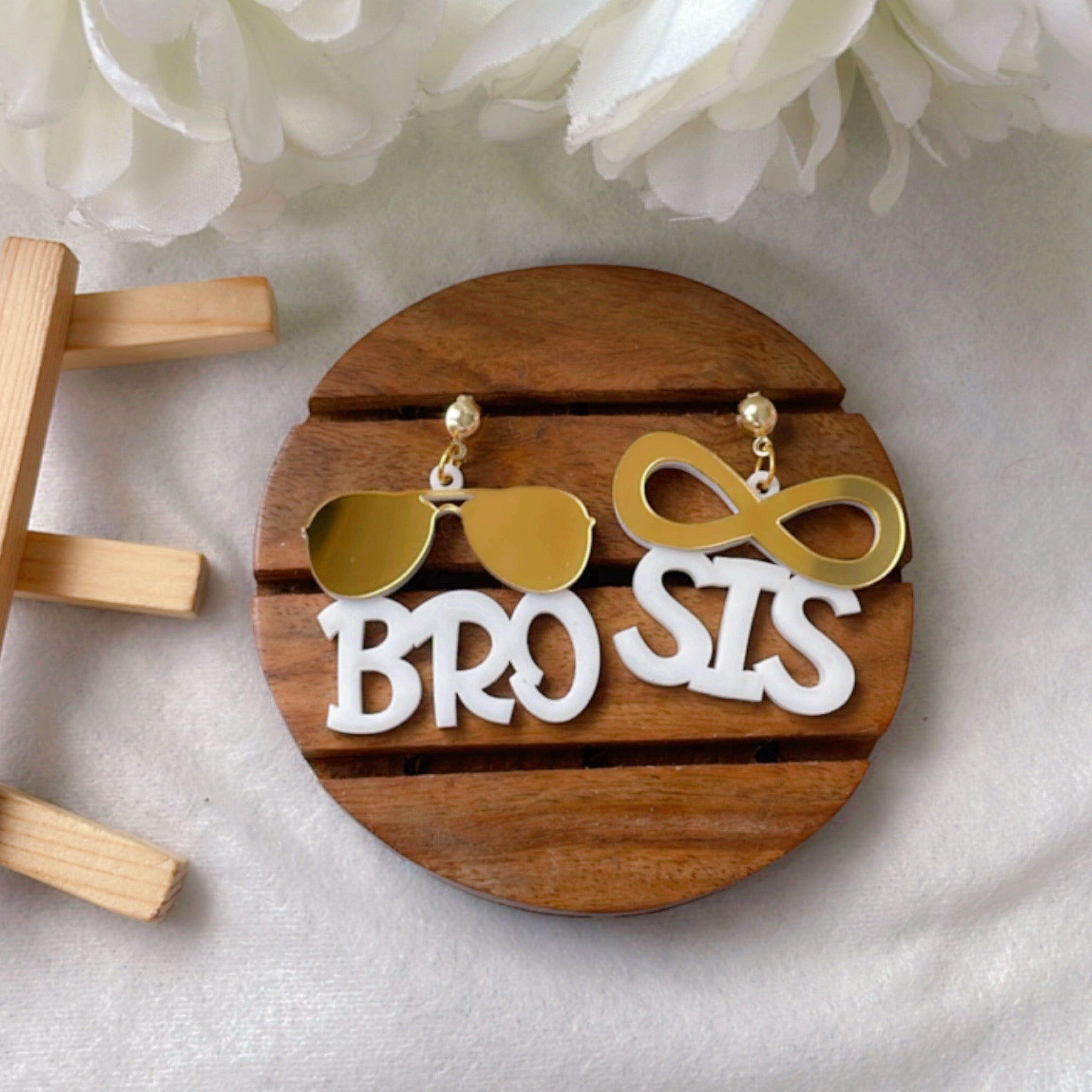 Bro Sis Earrings - Rakhi Special - White and Golden - Nian by Nidhi - placed in a white background