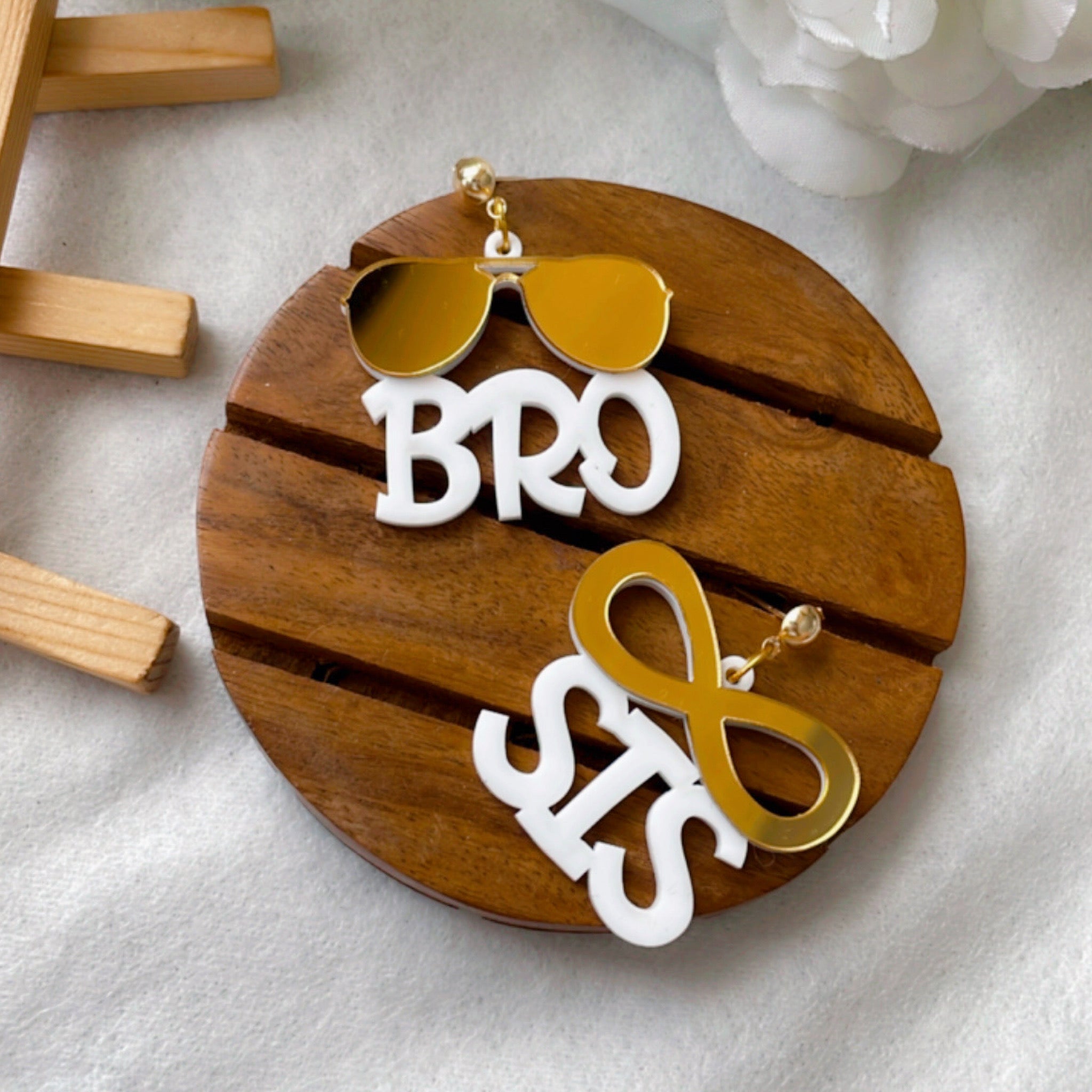 Bro Sis Earrings - Rakhi Special - White and Golden - Nian by Nidhi - placed in a white background