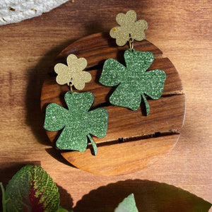 Clover Earrings - Green and Golden - Nian by Nidhi - in a white and brown background