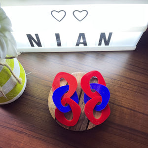 Link Chain Earrings (Red and Blue) - Lightning Earrings - Golden and Blue - Nian by Nidhi - in a white and brown background with a Nian's white lightbox